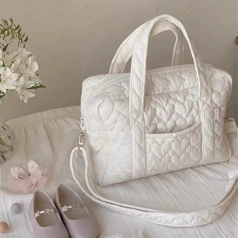 Sac à langer matelassé en coton bio élégant pour la naissance