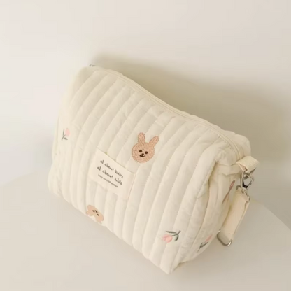 Trousse à langer portable en coton bio pour poussette — design lapin, pratique et écologique pour organiser les essentiels de bébé